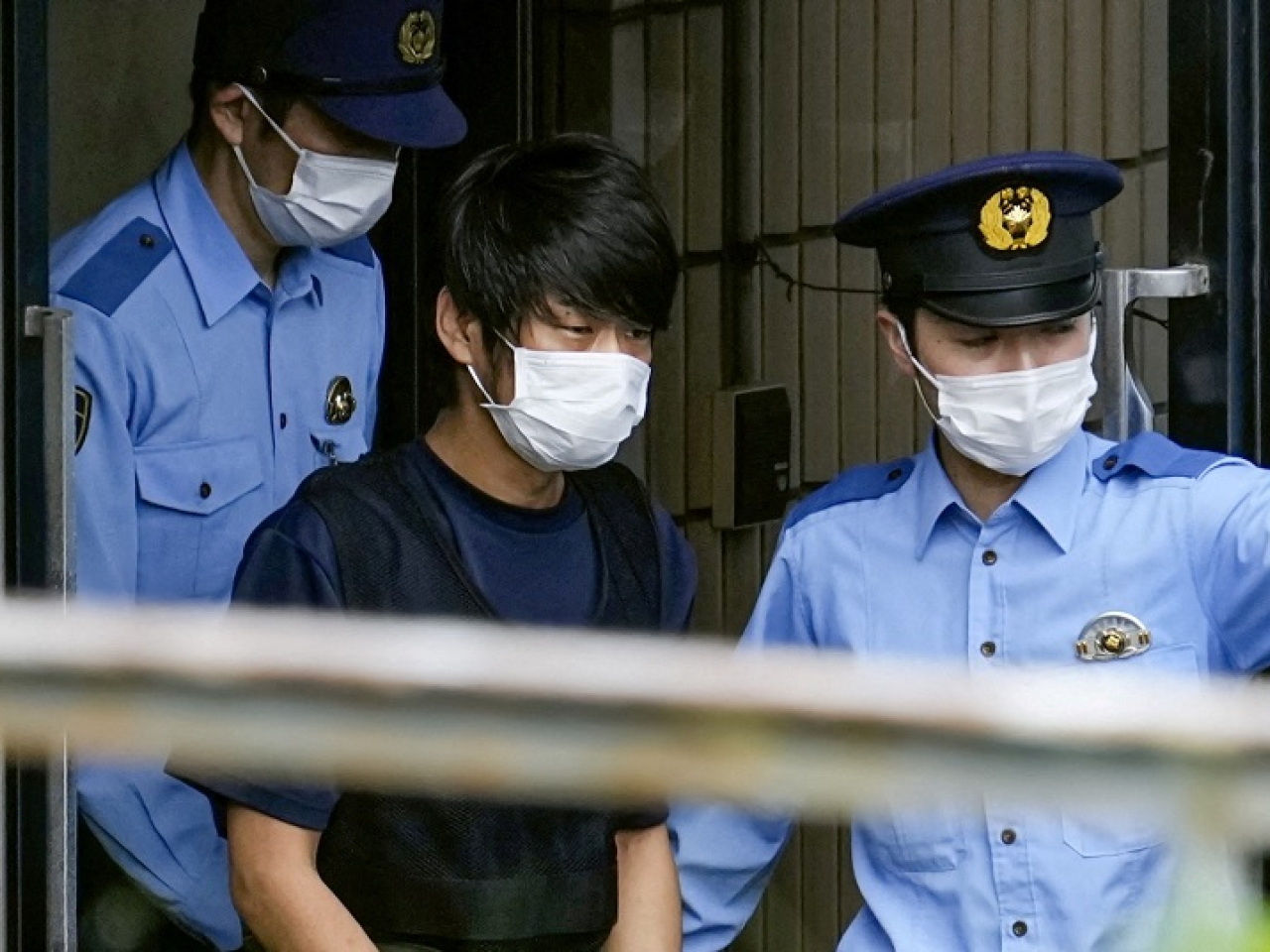 Tetsuya Yamagami appears at a police station in Nara in July 2022 after his arrest. He has received a life sentence over the killing. File photo: Kyodo via Reuters