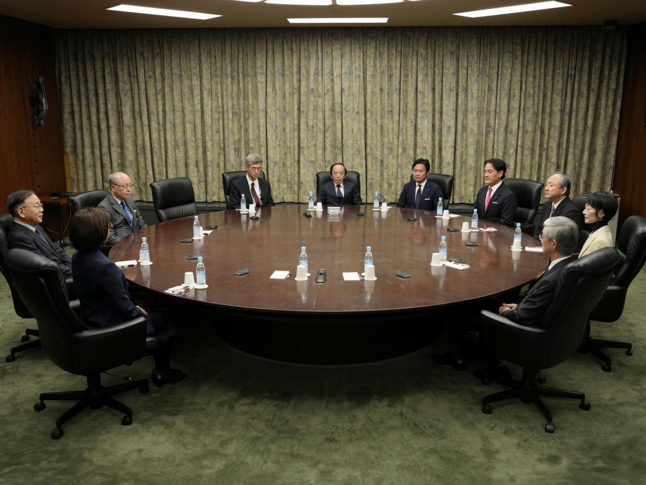 Bank of Japan governor Kazuo Ueda, centre, presides over the policy-setting meeting in Tokyo. Photo: Kyodo/Reuters