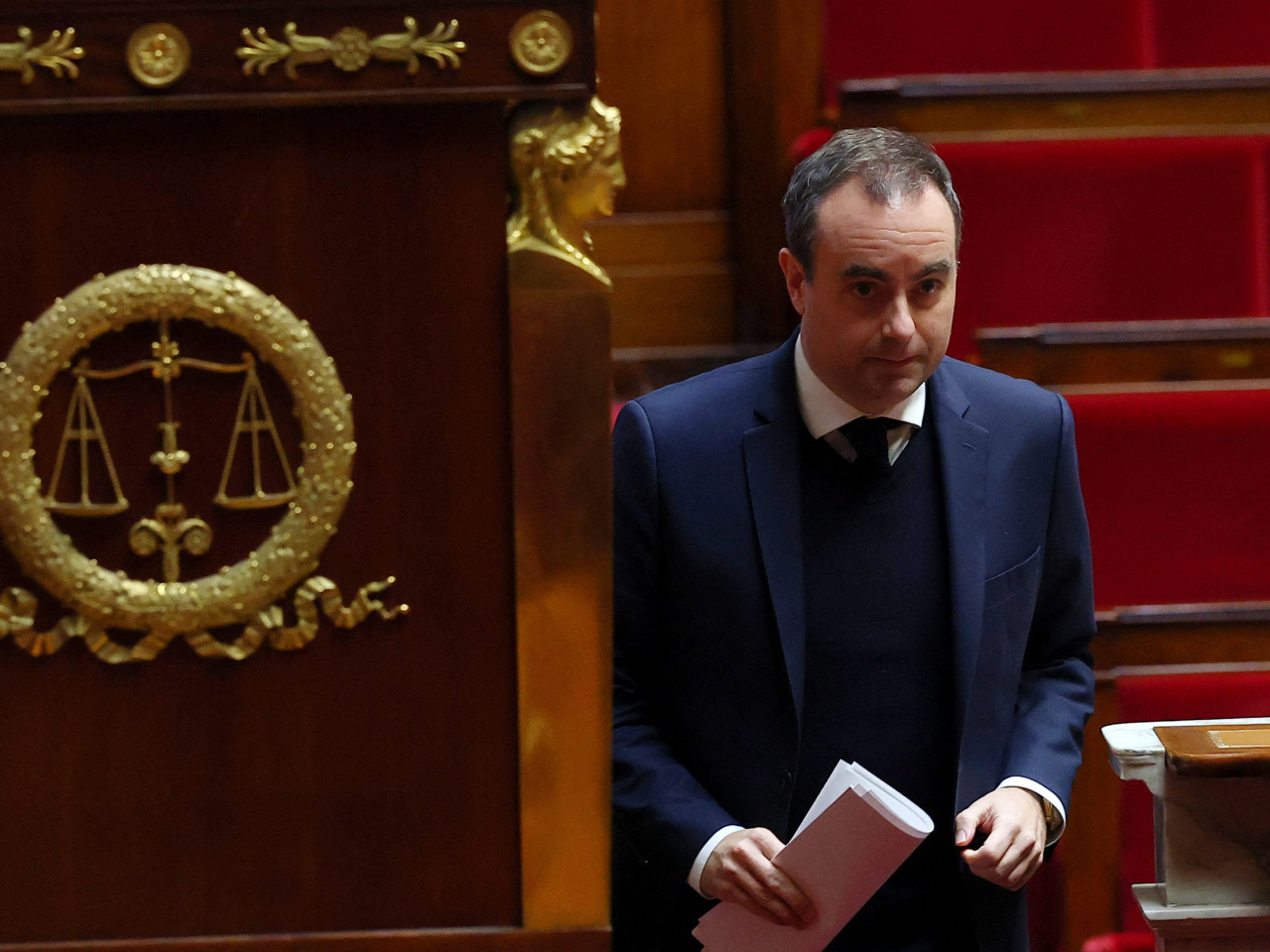 勒科爾尼領導的政府順利過關、繼續履職。（路透社）