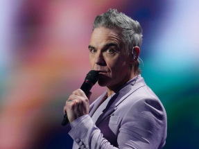 "Britpop" is Robbie Williams' 16th album to top the UK charts. File Photo: AFP