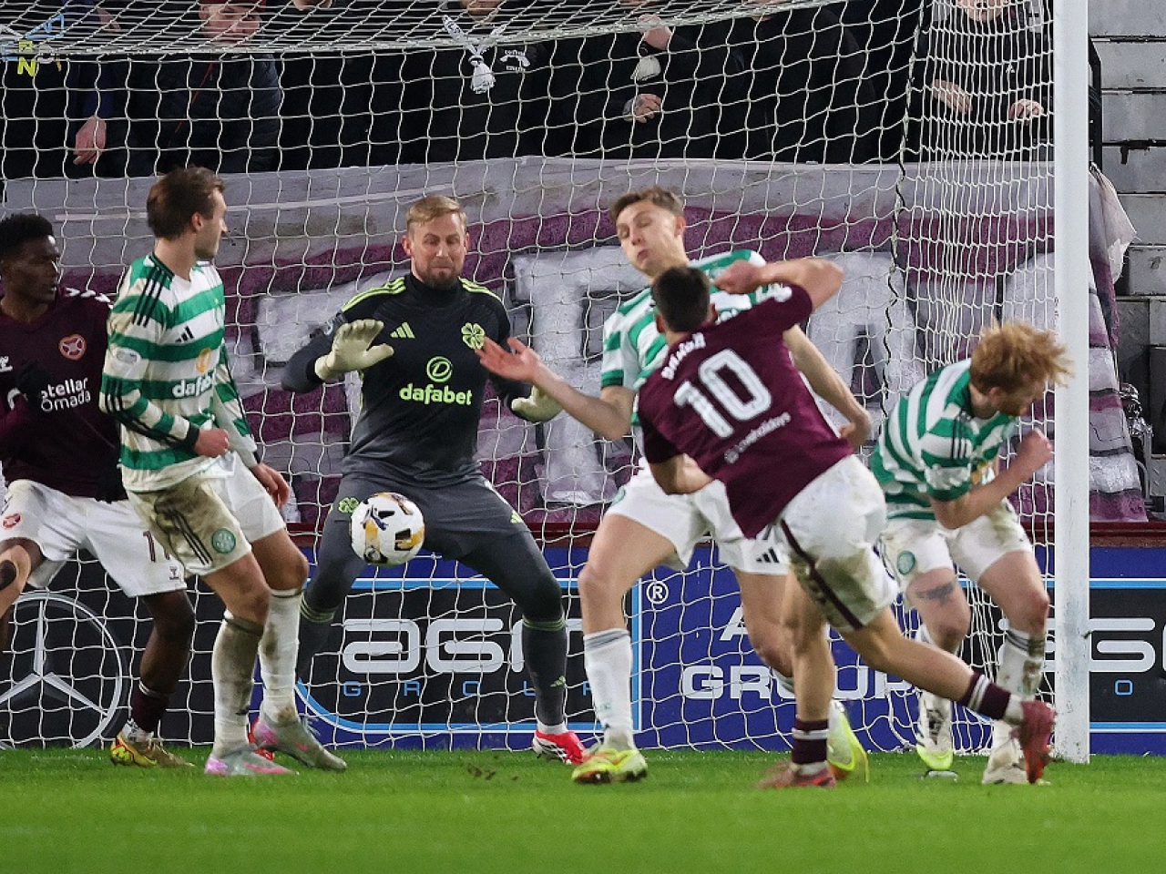 Claudio Braga smashes home the equaliser for the Jambos three minutes from time. Photo: Reuters