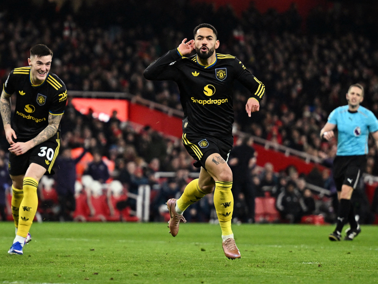 英超曼聯作客3:2阿仙奴。（路透社）