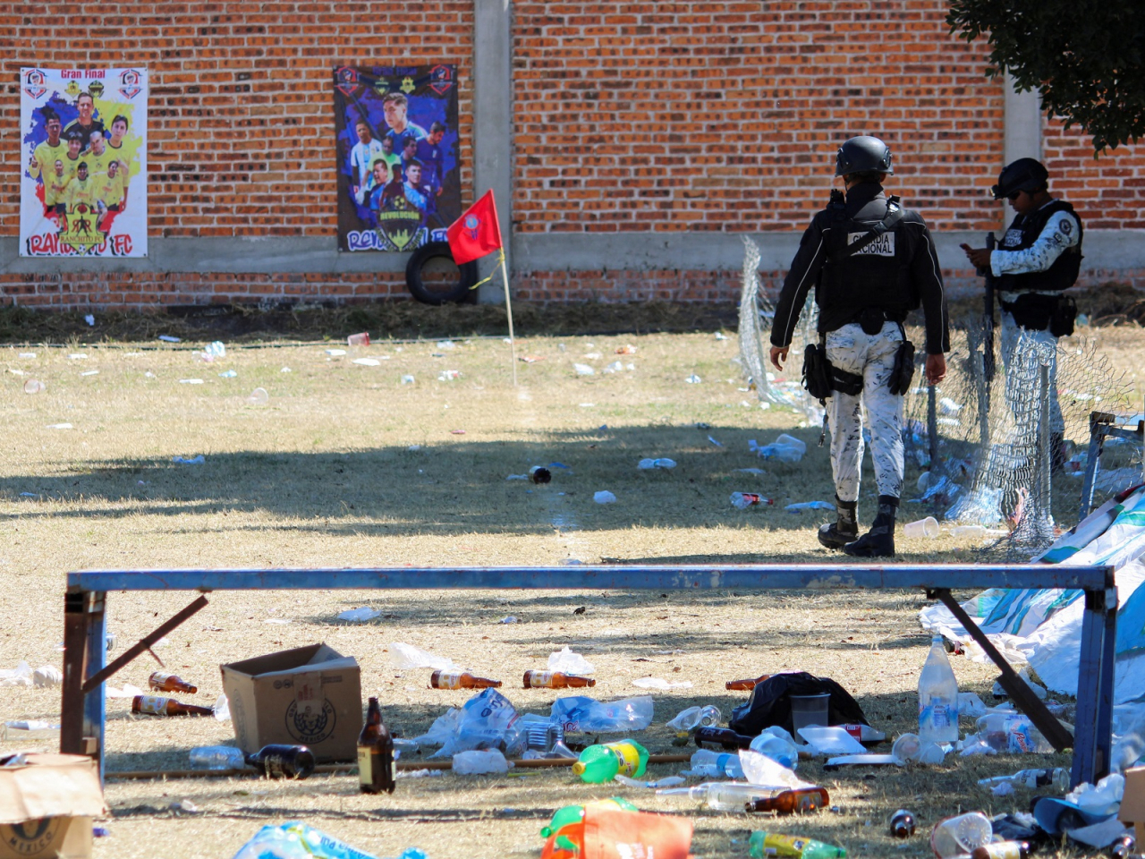 Members of the National Guard stand guard at the site where armed attackers killed 11 people at a soccer field after a match in Salamanca, Mexico. Photo: Reuters