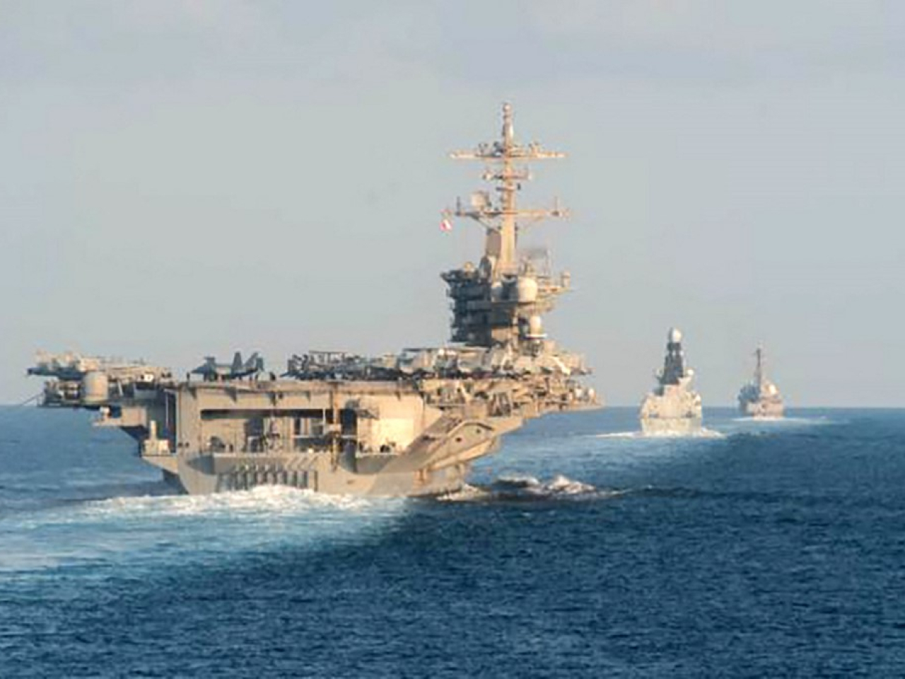 The deployment of the USS Abraham Lincoln aircraft carrier strike group dramatically boosts American firepower in the region. File photo: AFP