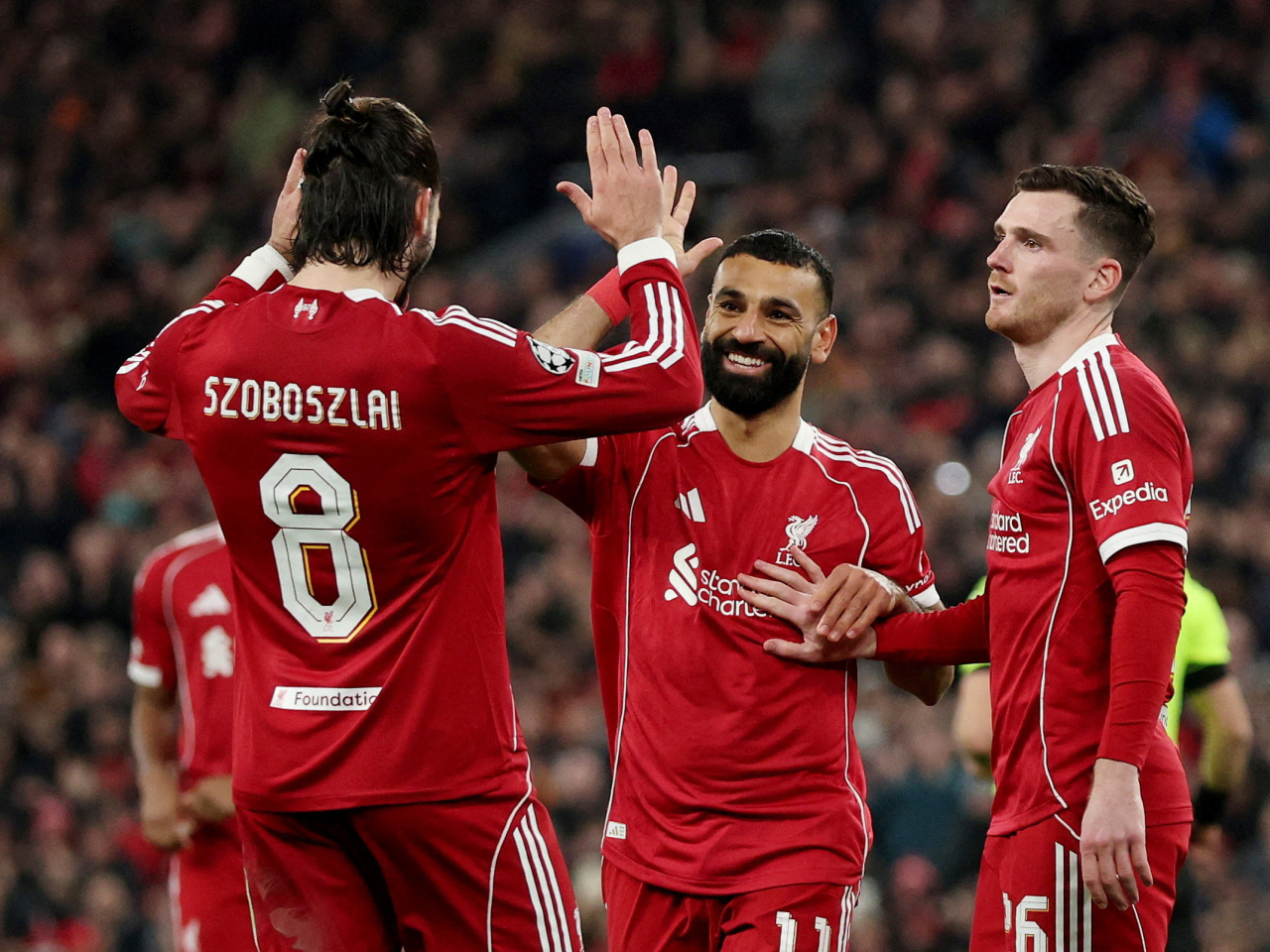 Liverpool powered to a 6-0 crushing of Qarabag at home to finish third in the league phase. Photo: Reuters