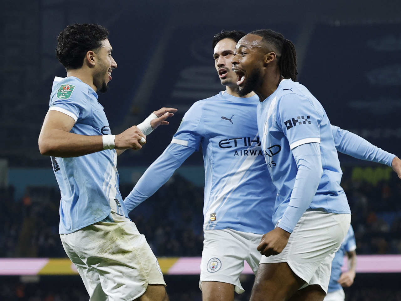 Omar Marmoush, left, struck twice for City en route to 3-1 second leg semi-final victory. Photo: Reuters
