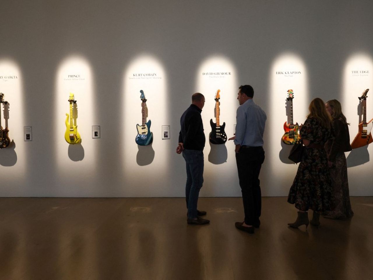 Up for auction are, from left, Jerry Garcia's 'Tiger', Prince's Andy Beech custom Yellow Cloud guitar, Kurt Cobain's 1966 Fender Mustang, David Gilmour's 'Black Strat', Eric Clapton&rsquo;s 'The Fool' Gibson SG and The Edge's Gibson Explorer. Photo: AFP