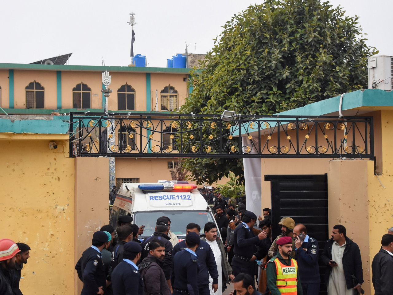 An ambulance evacuates casualties after a deadly explosion at a mosque in Islamabad. Photo: Reuters