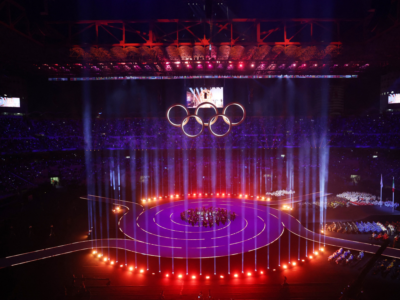 冬奧會開幕式在米蘭聖西羅體育館舉行。（路透社）