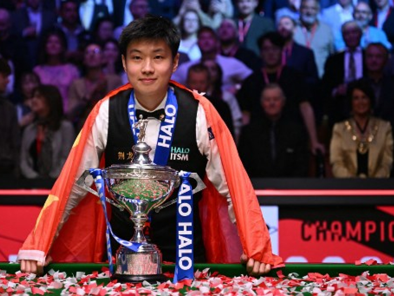 Zhao Xintong wins the World Championship last year. He's now celebrating his latest title in Hong Kong. File photo: AFP