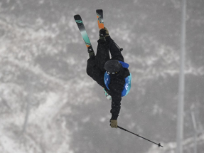 Trump attacks US Olympic skier with 'mixed emotions'