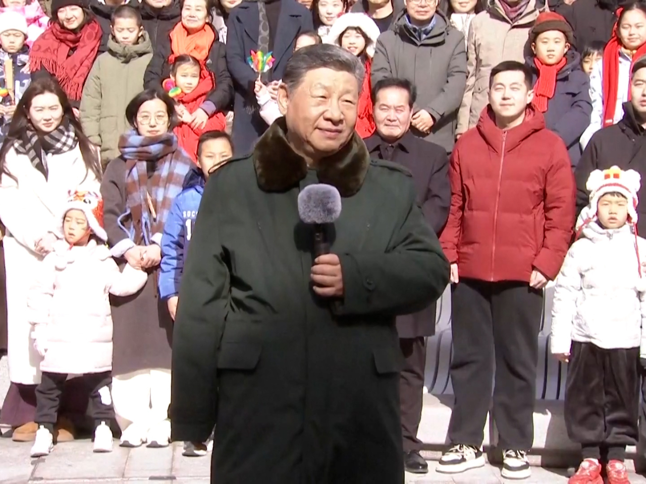 President Xi Jinping visits primary-level officials and residents in Beijing. CCTV screengrab