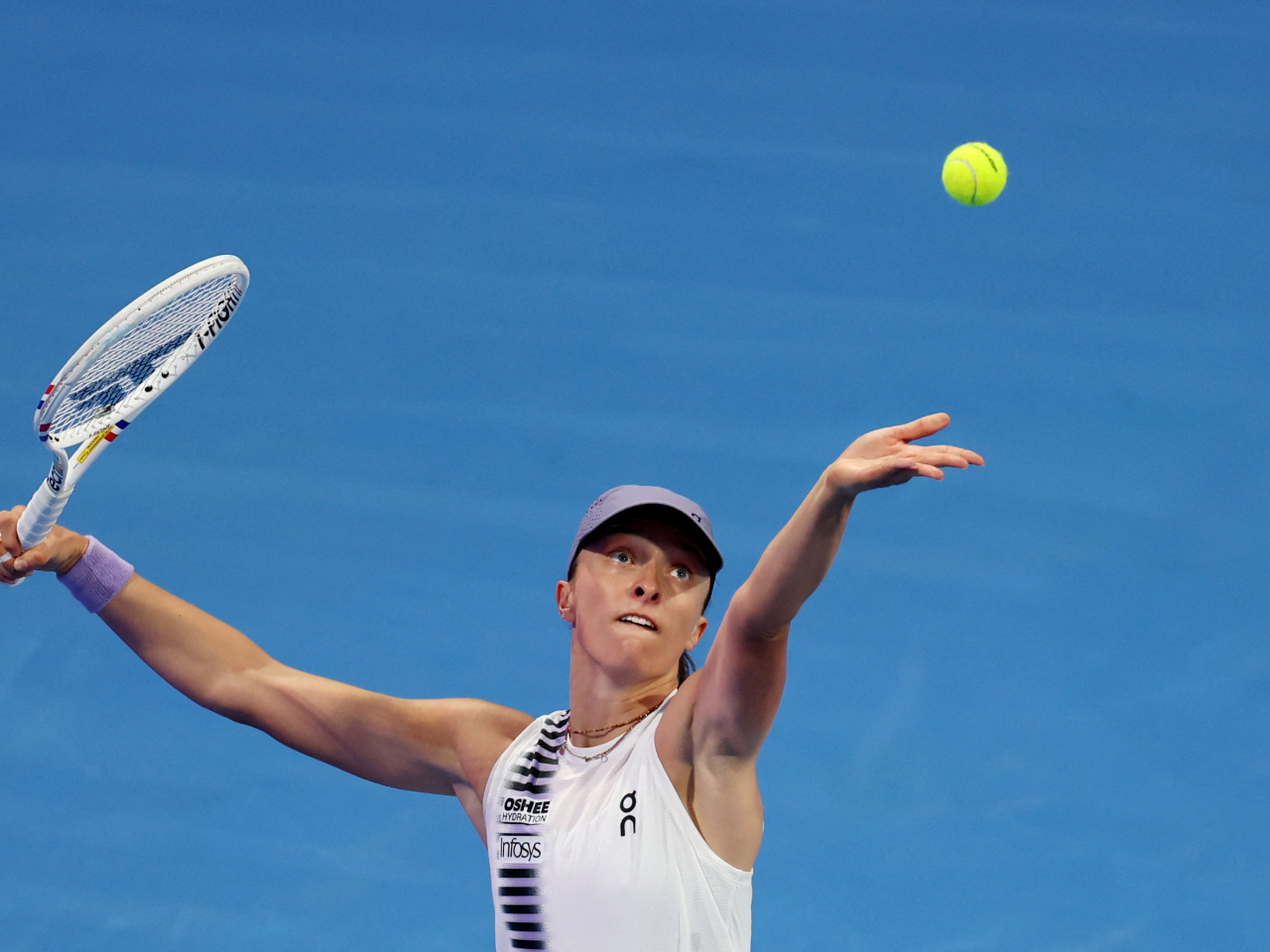 Top-seeded Swiatek was bundled out in Doha in two and a half hours. Photo: Reuters