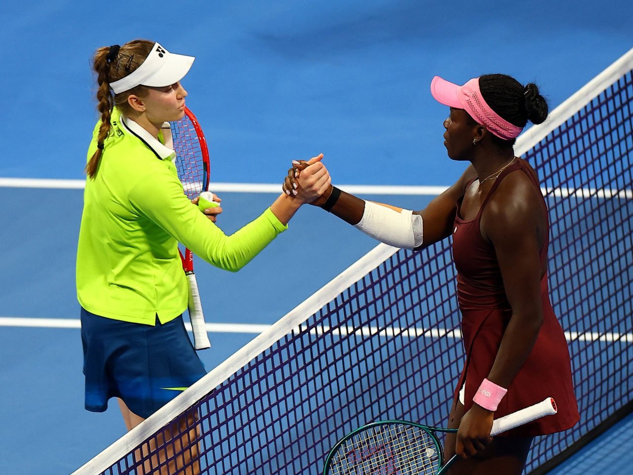 Canada's Victoria Mboko, right, stunned reigning Australian Open champion Rybakina in three sets. Photo: Reuters