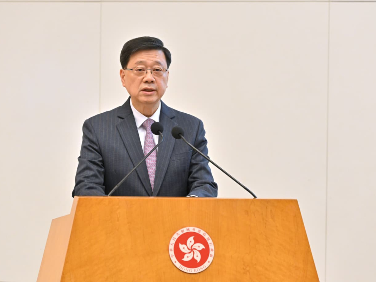 John Lee delivers a speech at a seminar on the white paper to safeguard national security. Photo courtesy of Information Services Department.