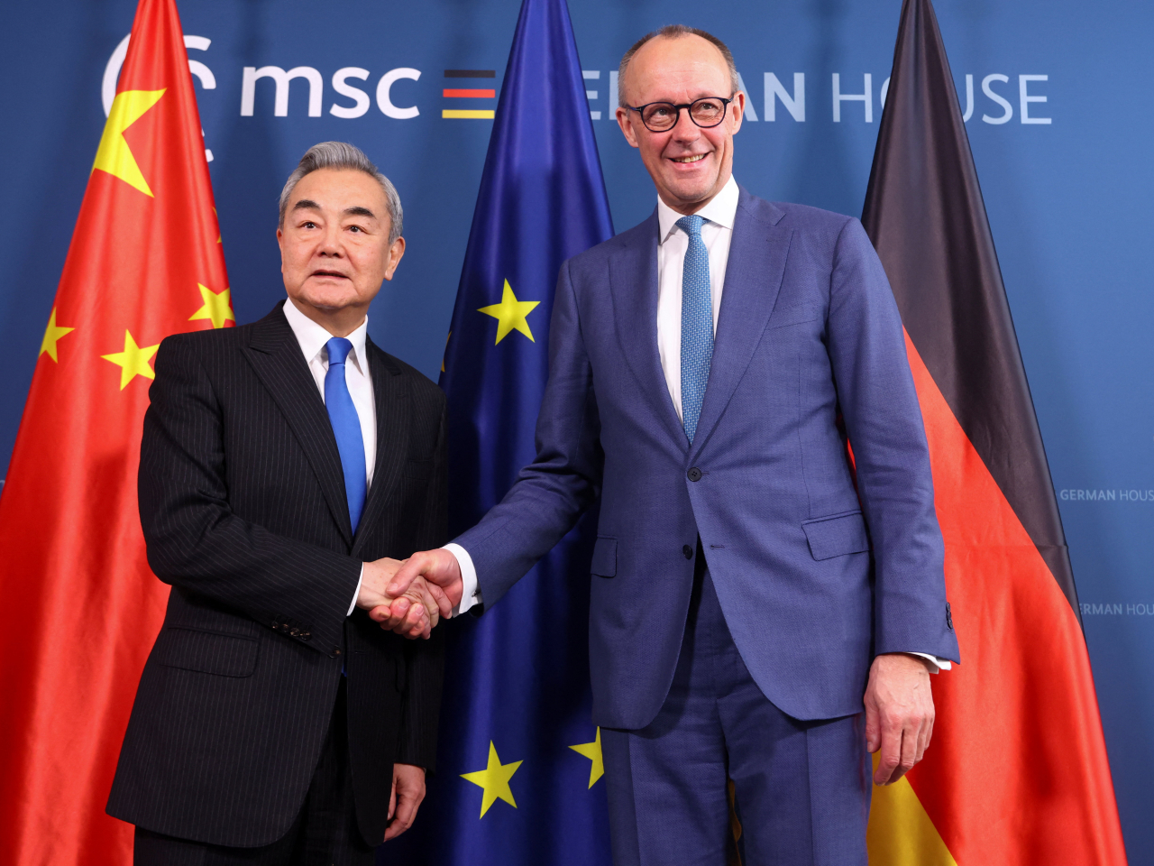 王毅與德國總理默茨會面。（路透社）