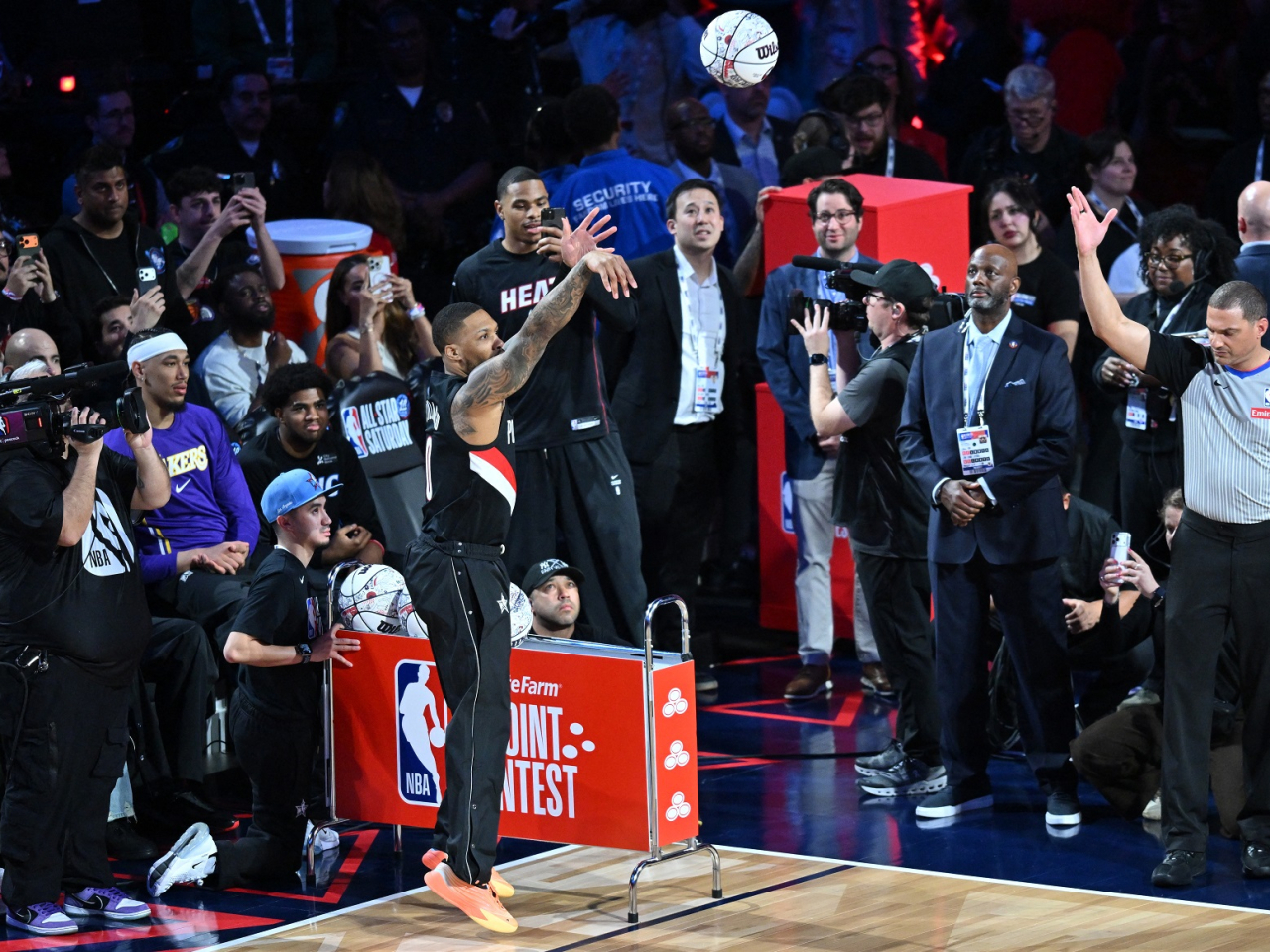 Portland's Damian Lillard wins the NBA Three-Point Contest for a record-tying third time. Photo: Reuters