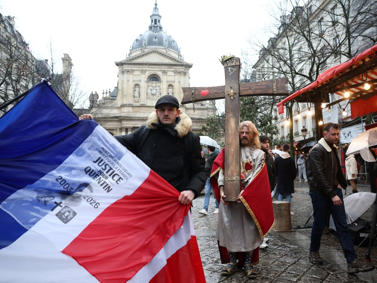 People gather in Paris to pay tribute to Quentin Deranque, an activist who died from injuries sustained during a beating on February 12 in Lyon. Photo: Reuters