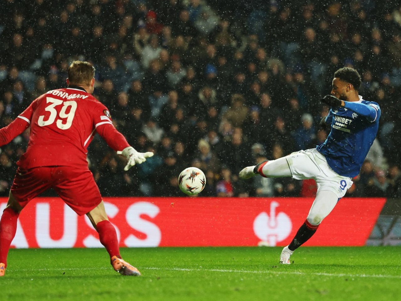 A hat-trick from Youssef Chermiti brought Rangers to within two points of leaders Hearts and sent Ibrox into raptures. Photo: Reuters