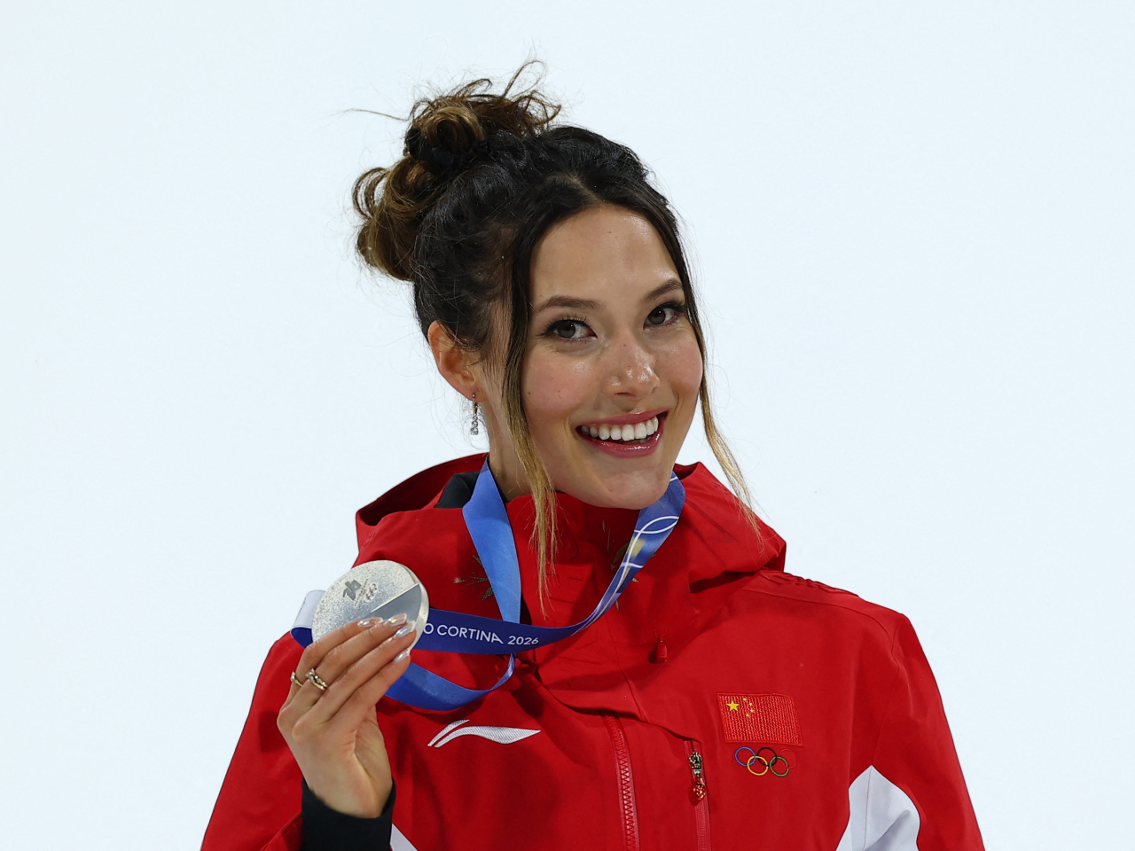 Caption: It was Gu's second silver medal at the Games after a runner-up finish in slopestyle. Photo: Reuters