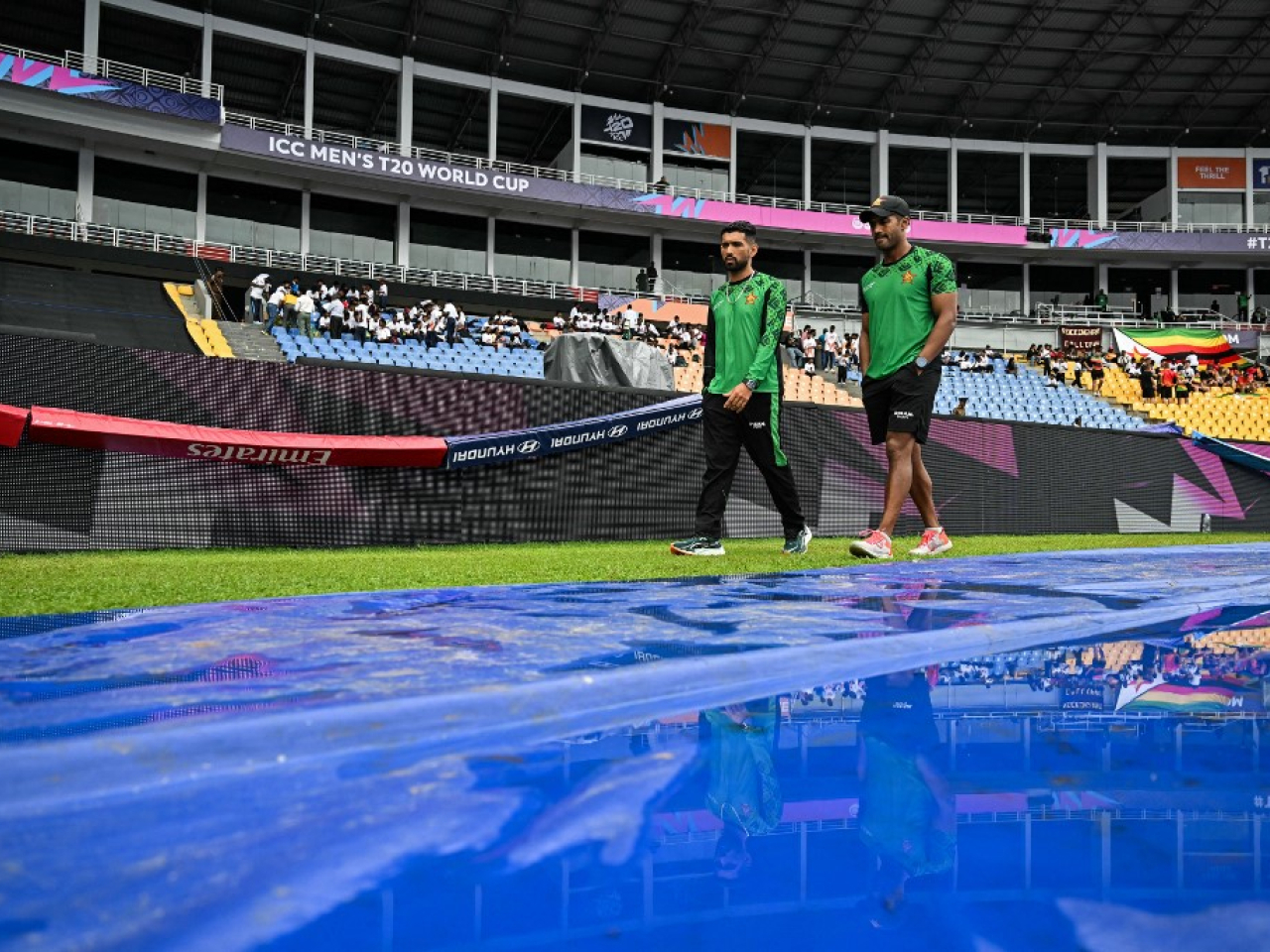 Zimbabwe qualified after persistent drizzle at the Pallekelle Stadium kept the covers on, and the umpires finally called off their game with Ireland at 5.30pm local time. Photo: AFP