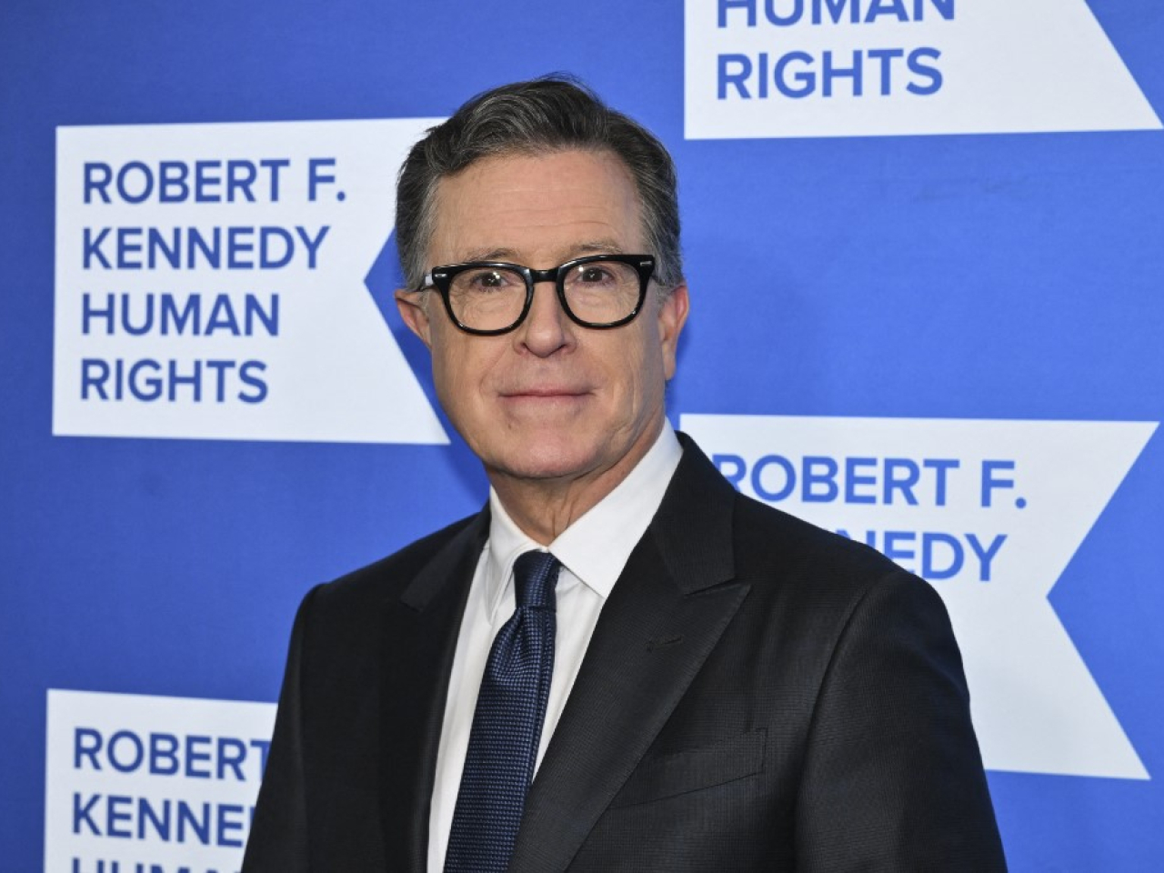 Stephen Colbert says he is 'just so surprised that this giant global corporation would not stand up to these bullies'. File photo: AFP