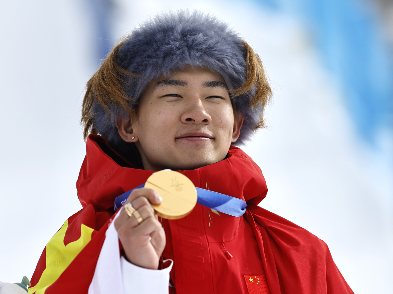 22歲國家隊選手蘇翊鳴，在米蘭科爾蒂納冬奧會，單板滑雪男子坡面障礙技巧決賽奪金。（新華社）