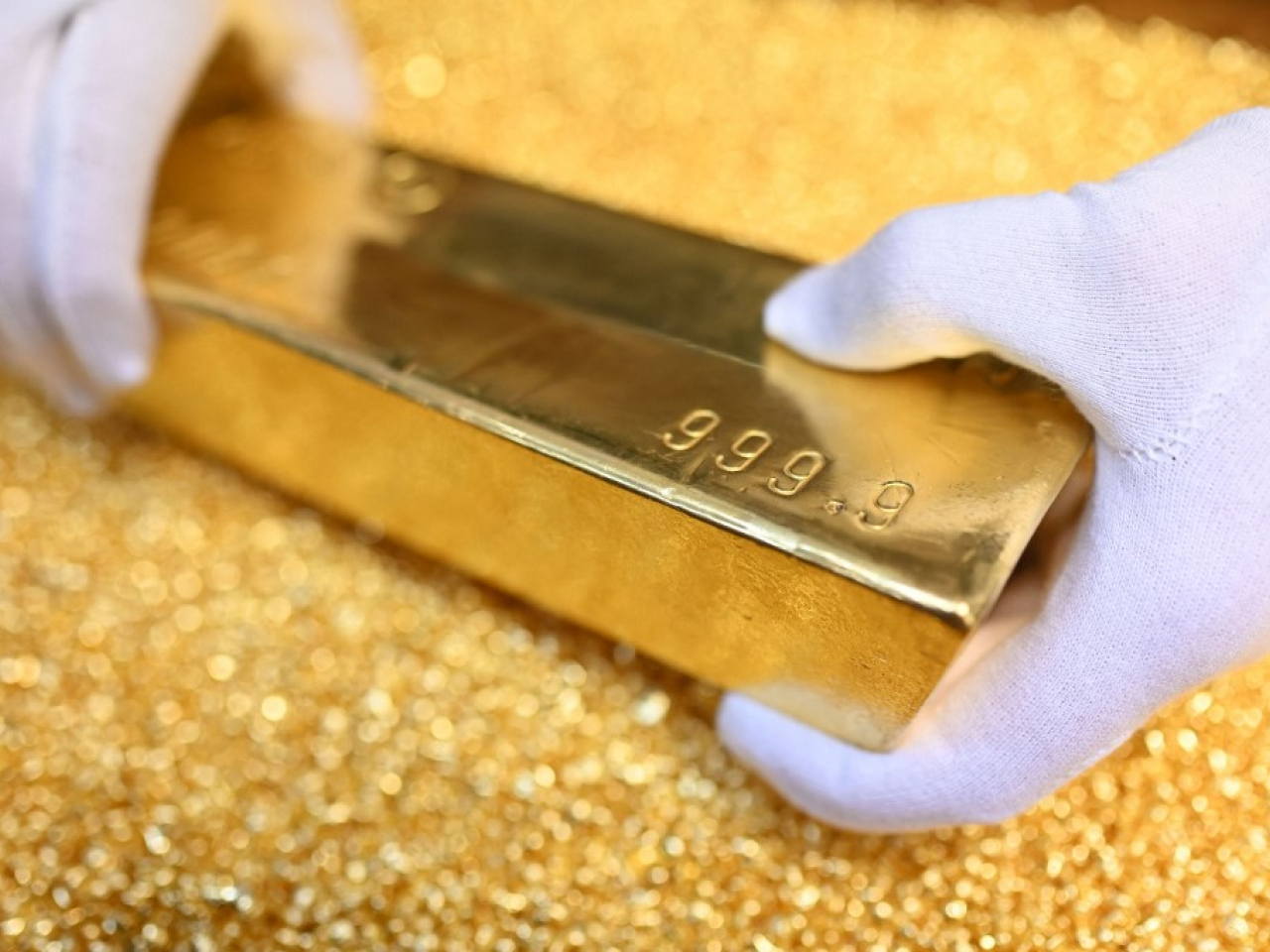 現貨金逼近每盎司5100美元，較早時報5095.21美元，升幅1.9%。（法新社資料圖片）