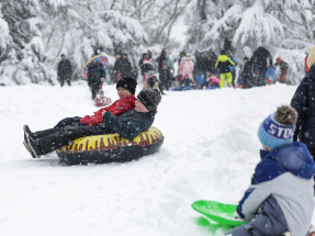 Children made the most of the snowy conditions in New York. Photo: Reuters