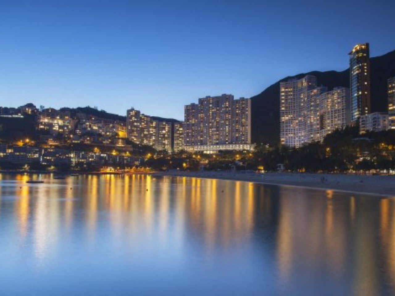 Paul Chan says raising stamp duties on high-end properties would help bring in an extra HK$1 billion to the government's coffers. File photo: AFP