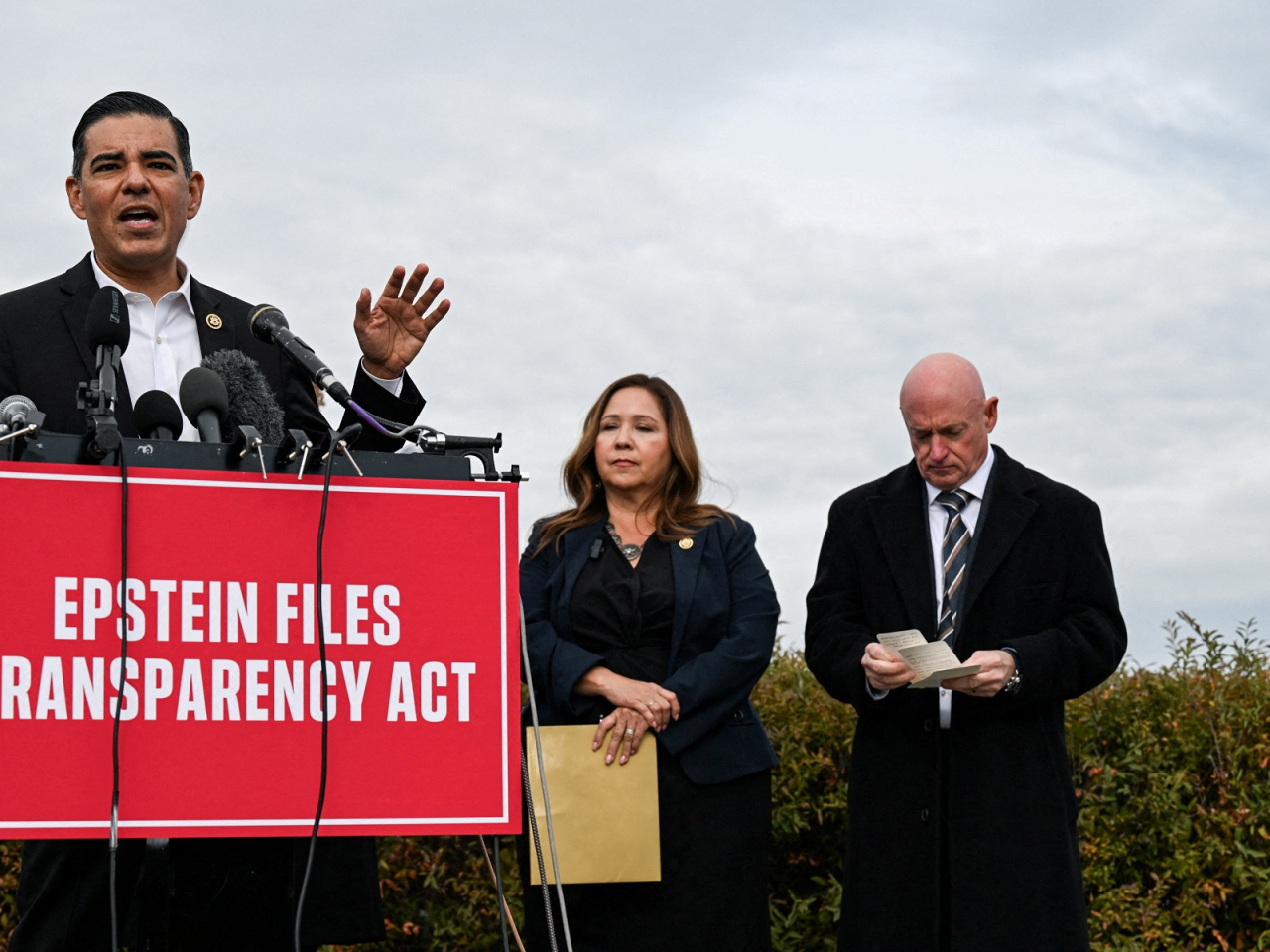 US Representative Robert Garcia (left) has accused the US Justice Department of illegally withholding FBI interviews with a woman who has accused Donald Trump of sexual abuse. Photo: Reuters