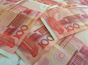 人民幣中間價報6.9228兌1美元，較上日中間價升93點子。（港台圖片）