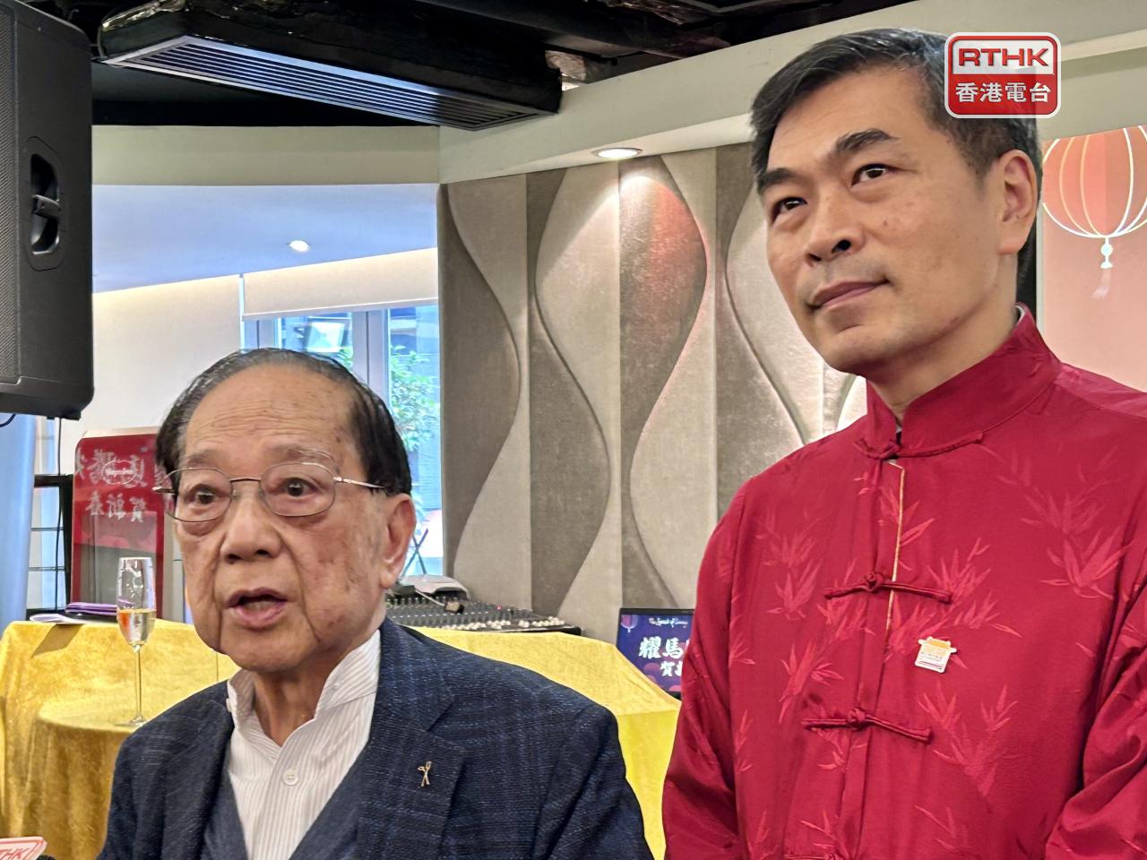 梁志堅（左）估計今年樓價再升8%至10%；黃光耀稱集團期望今年內趁機吸納新項目。（羅煒皓攝）