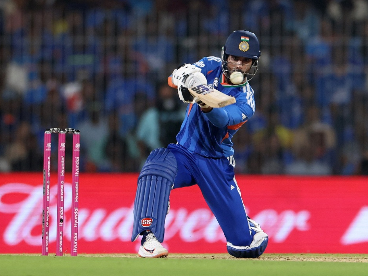 India's Tilak Varma smashes another four on his way to a 16-ball 44. Photo: Reuters