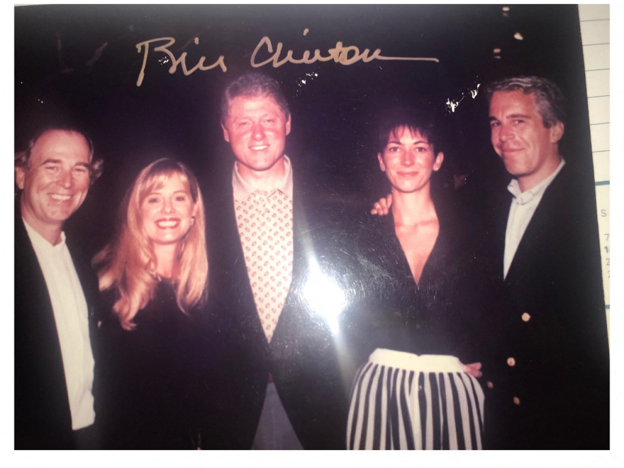 Bill Clinton (centre) features prominently throughout the Epstein files, but he insists that he broke ties well before Epstein's 2008 conviction for sex offences. Photo: Reuters