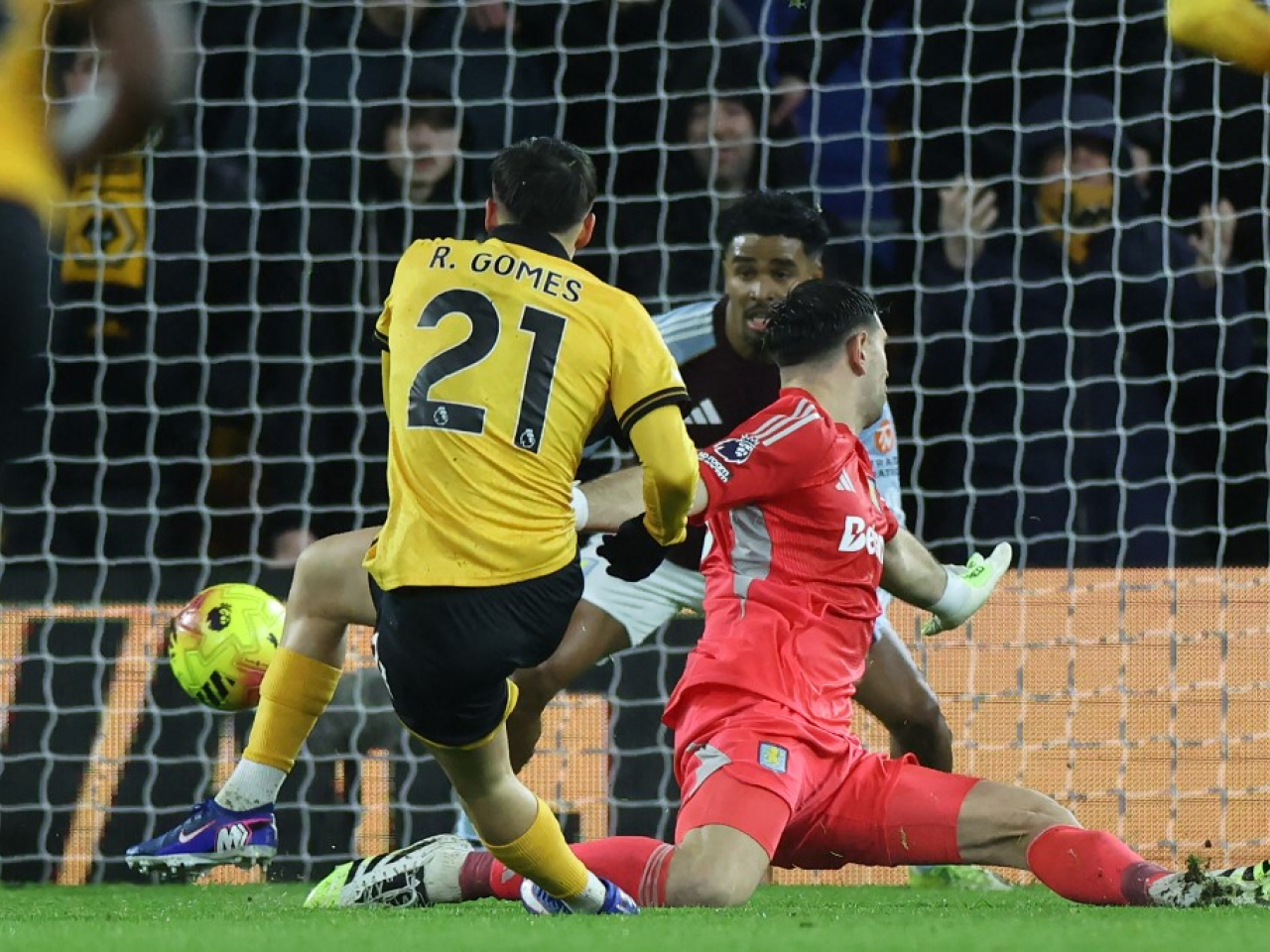 Wolverhampton Wanderers' Portuguese Rodrigo Gomes scores his team's second goal. Photo: AFP