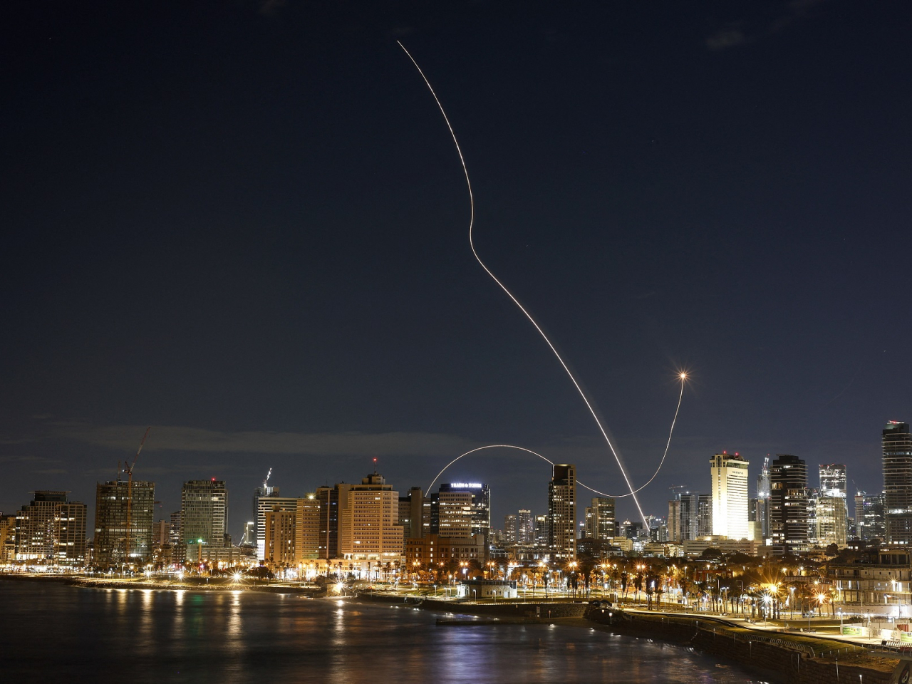 An interception attempt is made by Israel in Tel Aviv, as missiles are launched from Iran. Photo: Reuters