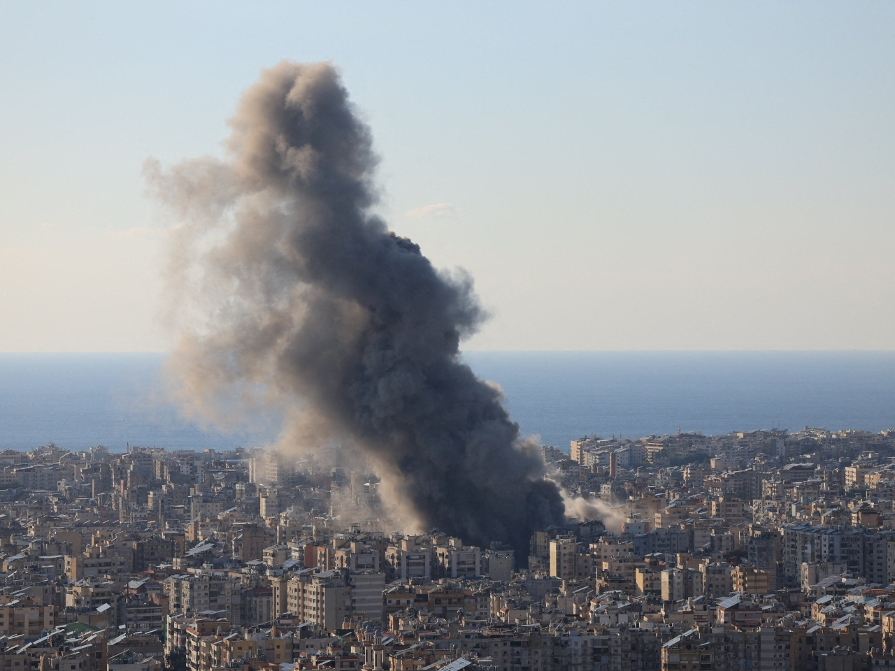 Smoke billows from buildings hit in an Israeli attack on southern Beirut. Photo: Reuters