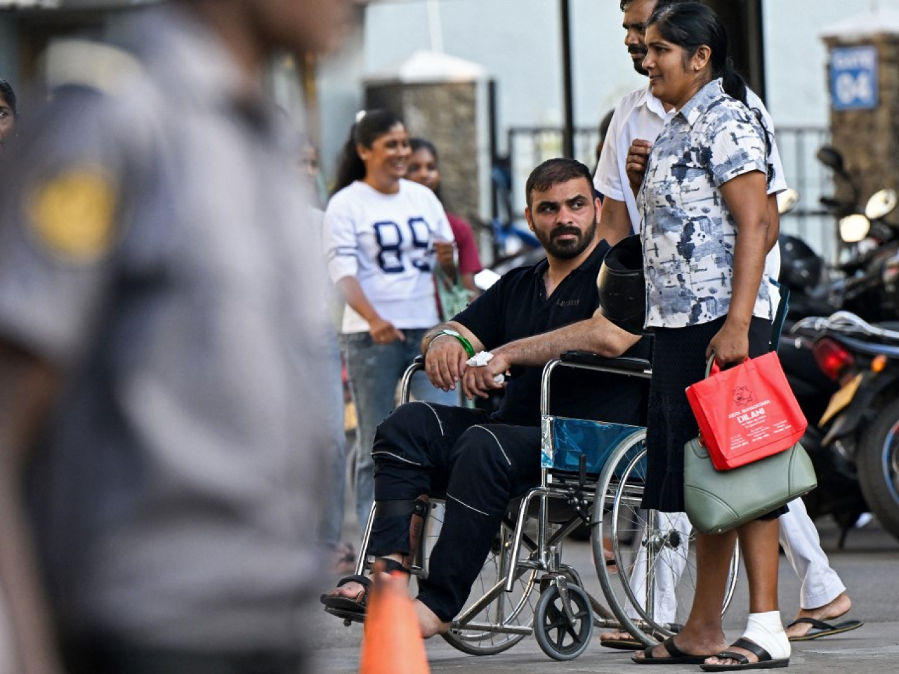 An injured Iranian sailor arrives at a hospital in Galle. Photo: AFP