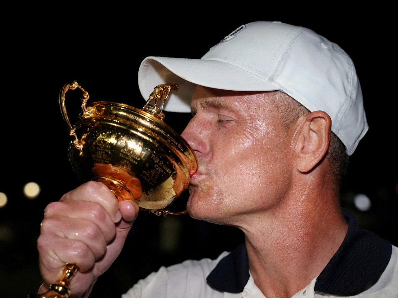 Team Europe captain Luke Donald kisses the trophy as he celebrates winning the Ryder Cup in 2025. File photo: Reuters