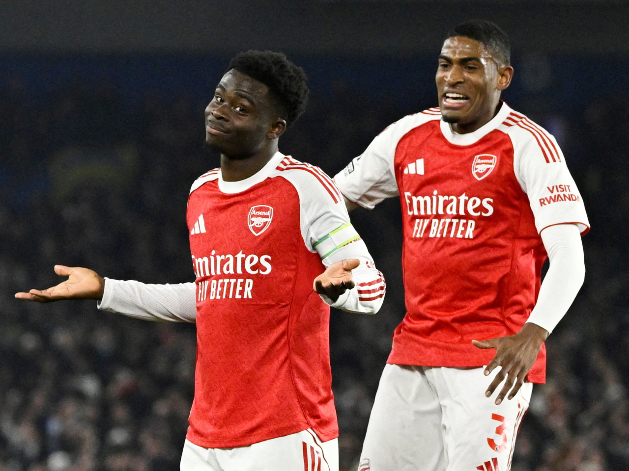 Bukayo Saka, left, scored the lone goal in the Gunners' narrow victory at Brighton. Photo: Reuters