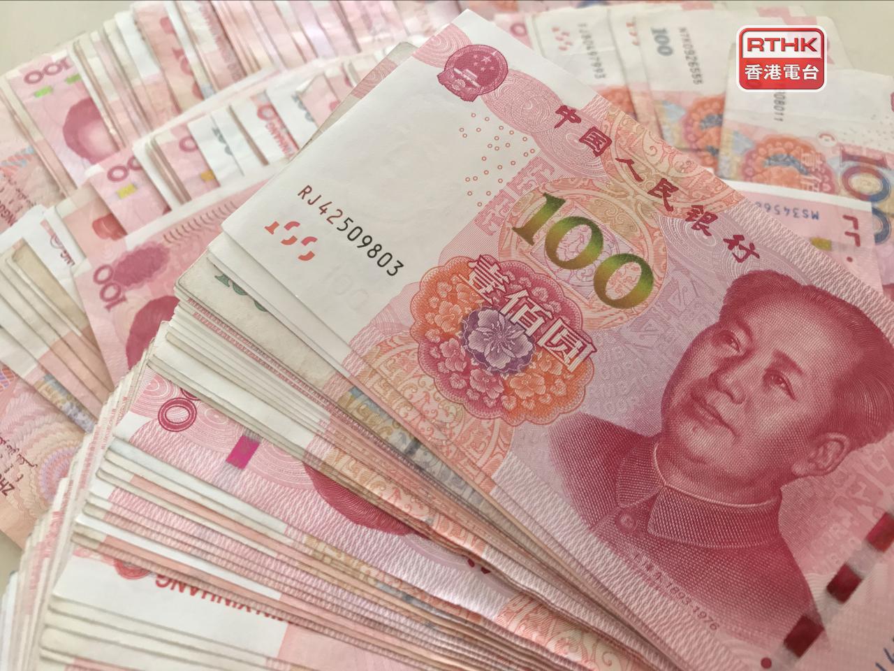 在岸人民幣收報6.9003兌1美元，較昨日收市價升117點子，升幅較初段明顯收窄。（港台圖片）