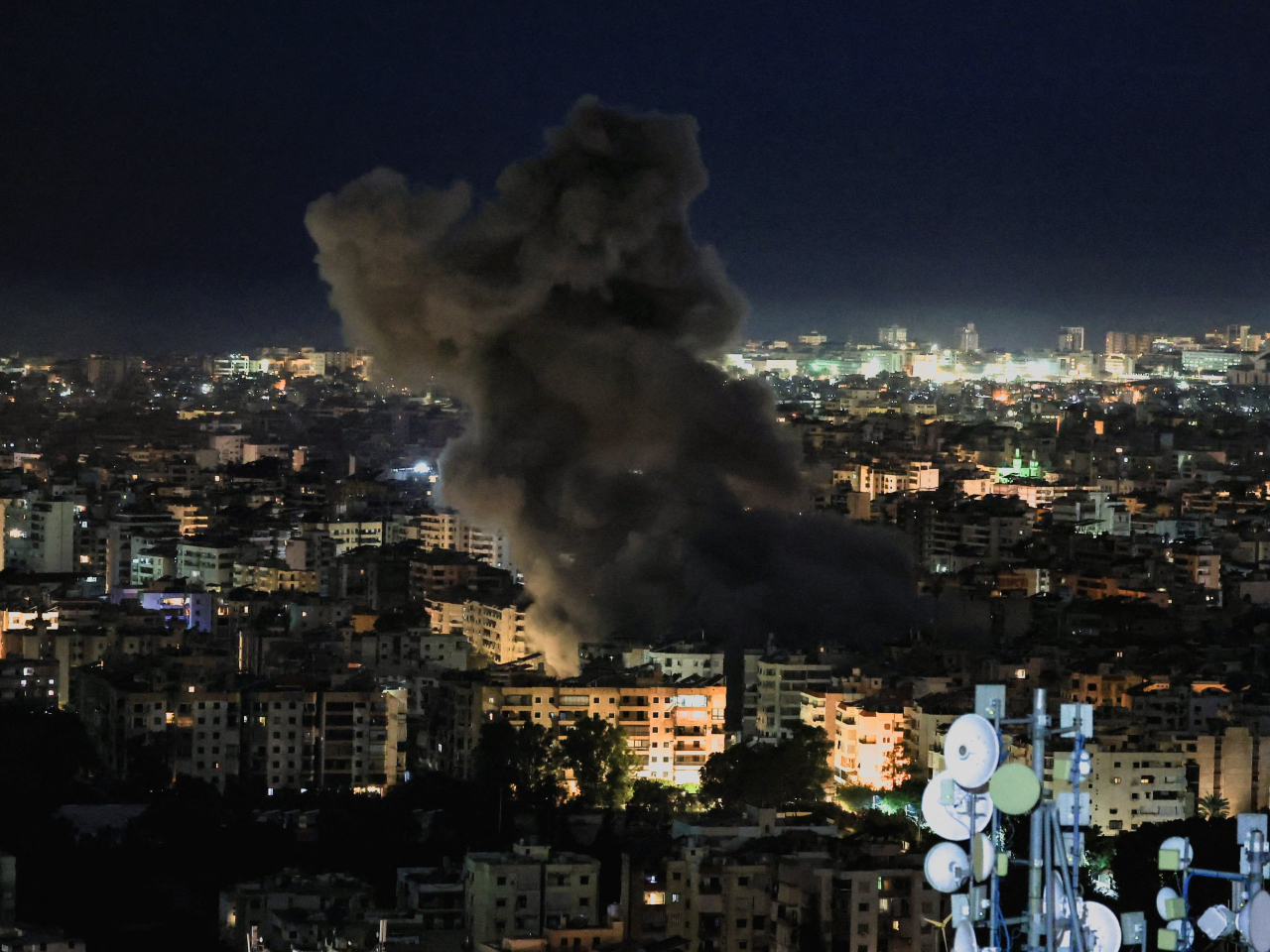 Israeli air strikes on Beirut's southern suburbs have sent residents fleeing in panic. Photo: Reuters