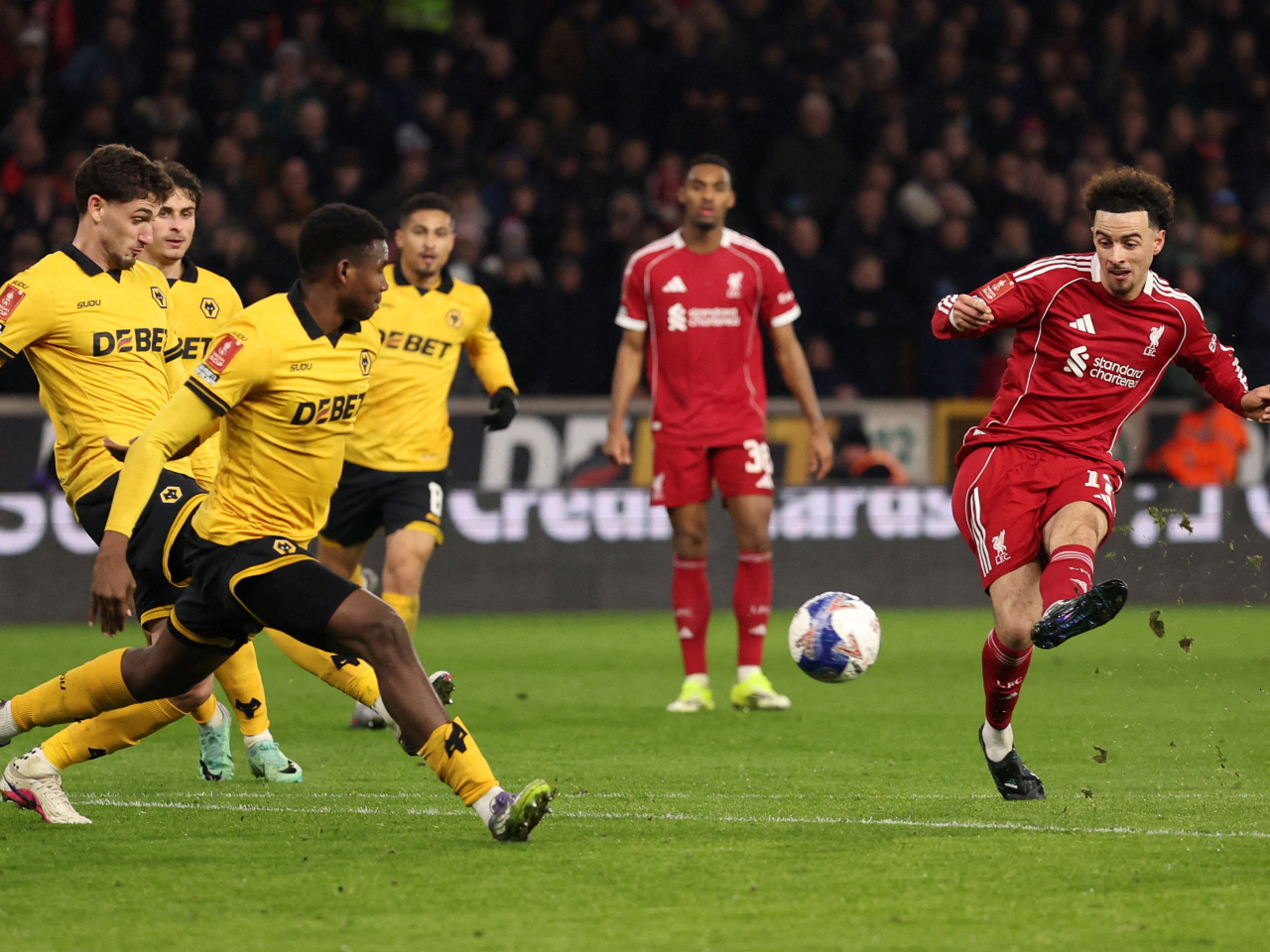 Curtis Jones wrapped up a much-needed fifth round victory for Liverpool after their embarrassing defeat three days earlier. Photo: Reuters