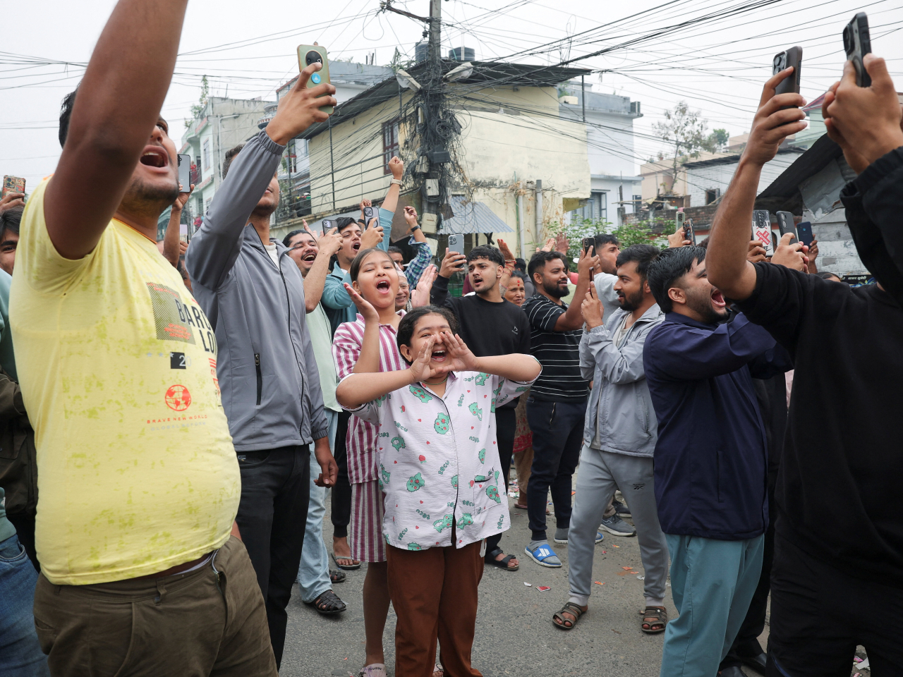 Rastriya Swatantra Party supporters celebrate in Damak, Jhapa district, after election officials announce that it is leading. Photo: Reuters