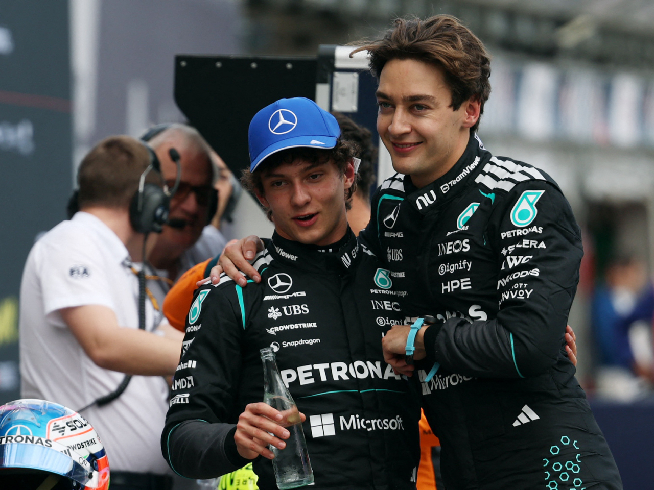 Andrea Kimi Antonelli and George Russell celebrate after taking the top two places in qualifying at the Australian Grand Prix in Melbourne. Photo: Reuters