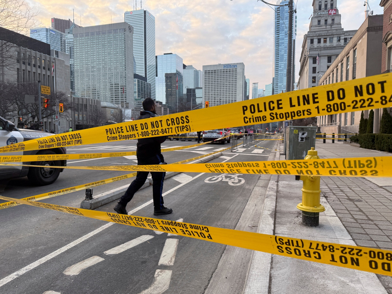 Two men fired multiple shots at the US consulate in Toronto early on Tuesday, but no one was injured in what police are investigating as a national security incident. Photo: Reuters