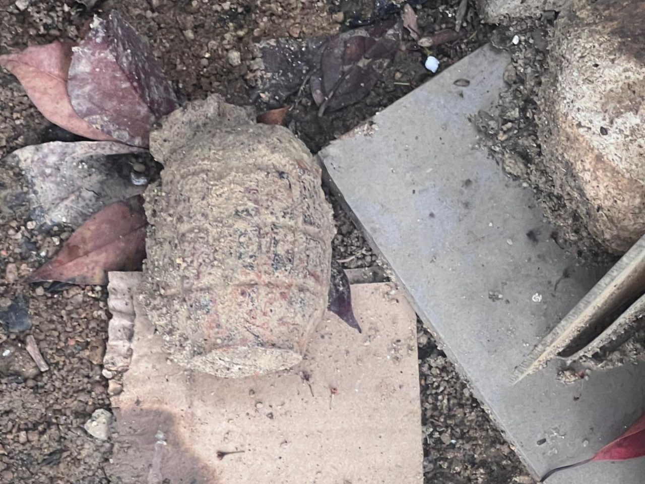 The device, described as being roughly the size of a lemon, was found on a slope along Stubbs Road. Photo courtesy of police