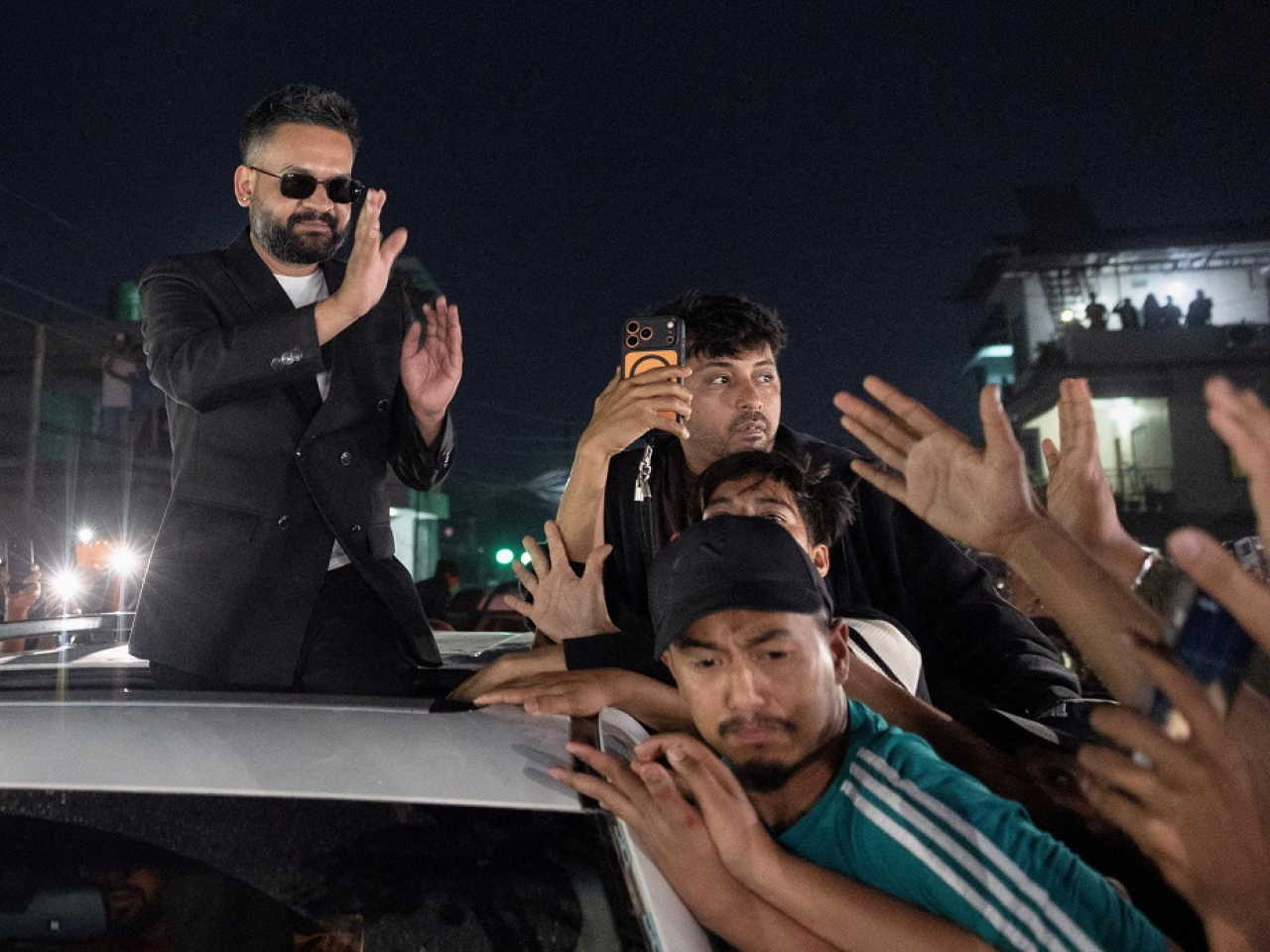 Rapper-turned-politician Balendra Shah celebrates after he defeated veteran four-time prime minister KP Sharma Oli in his own seat. Photo: Reuters