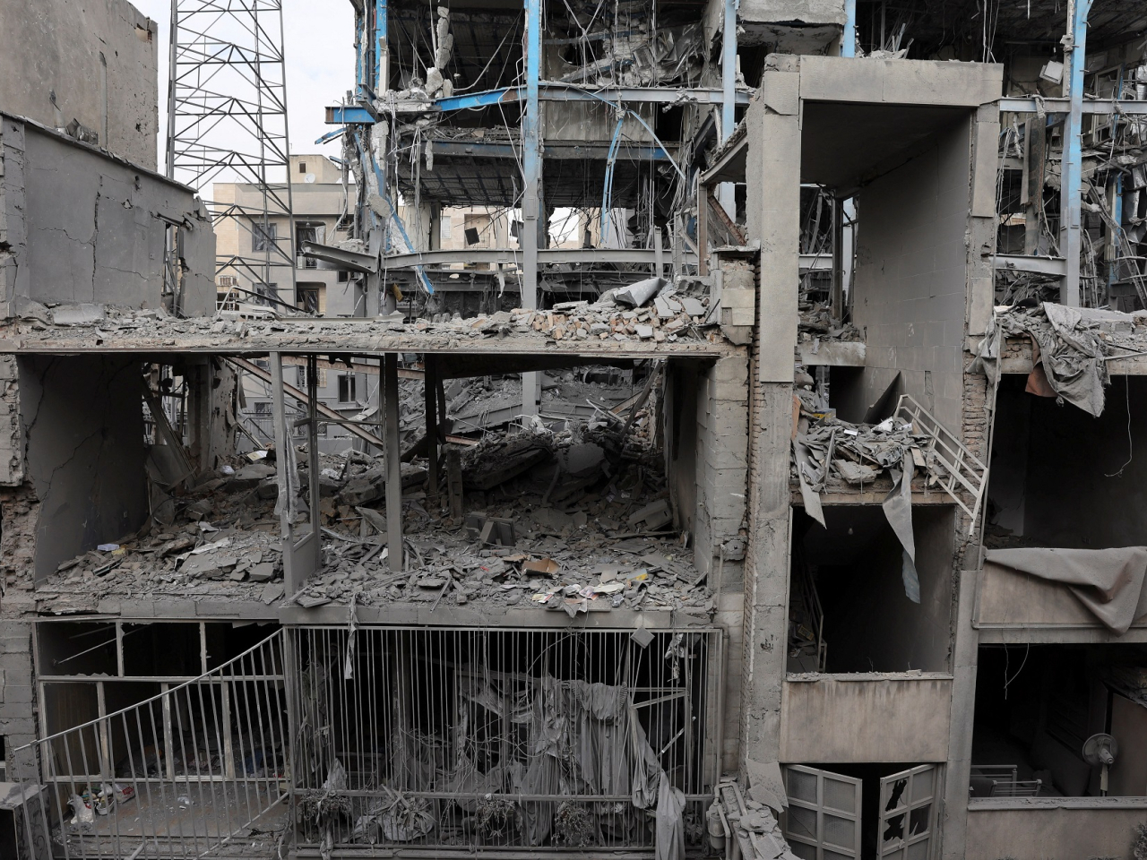 A building in Tehran is damaged by a strike amid US-Israeli conflict with Iran. Photo: Majid Asgaripour/West Asia News Agency via Reuters